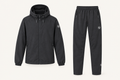 Dark jacket and trousers studio image